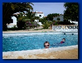 Pete in the local pool - our villa in the background