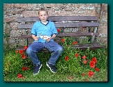 Simon on the bench in the garden